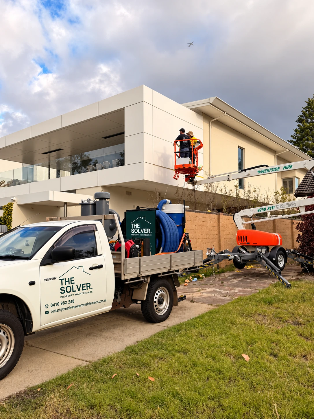 The Solver Property Maintenance ute with industrial gutter vacuum and boom lift on a Perth job